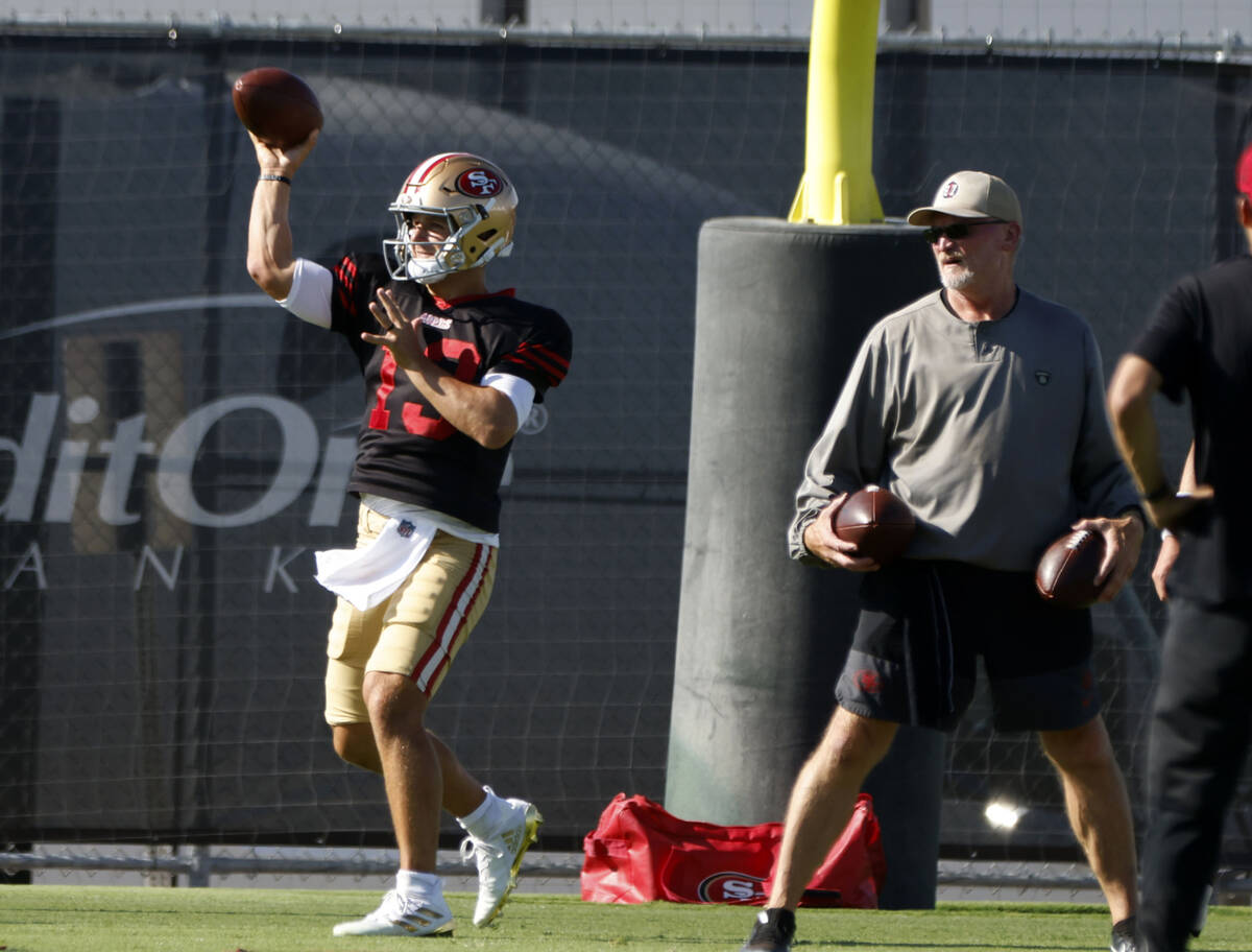 San Francisco 49ers quarterback Brock Purdy throws the ball during a joint practice with Raider ...