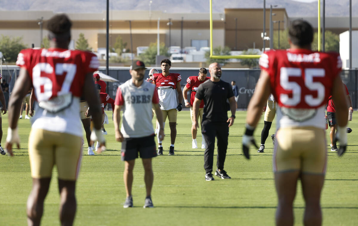 San Francisco 49ers players warm up before a joint practice with Raiders at the Intermountain H ...