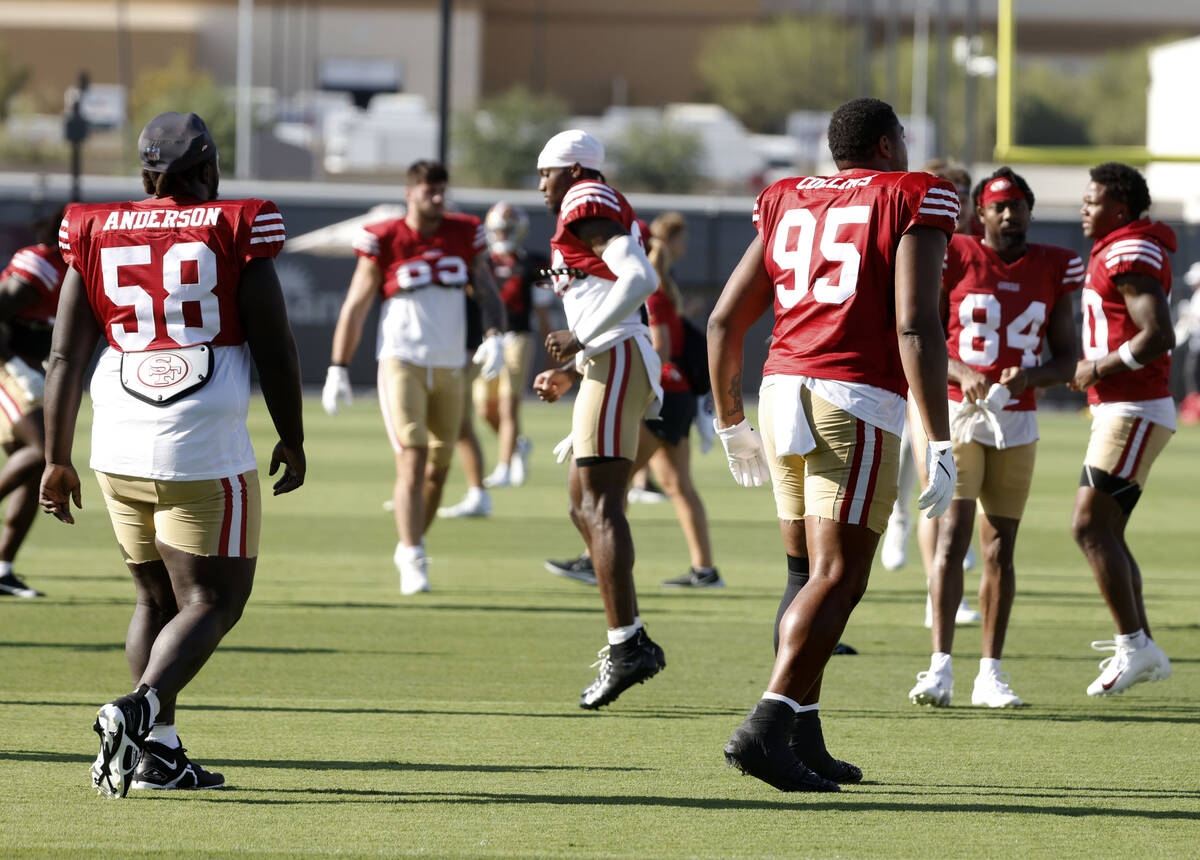 San Francisco 49ers players warm up before a joint practice with Raiders at the Intermountain H ...