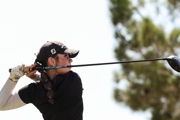 Faith Lutheran’s Maddie Perez tee’s off during Class 5A girls golf Mountain Leagu ...