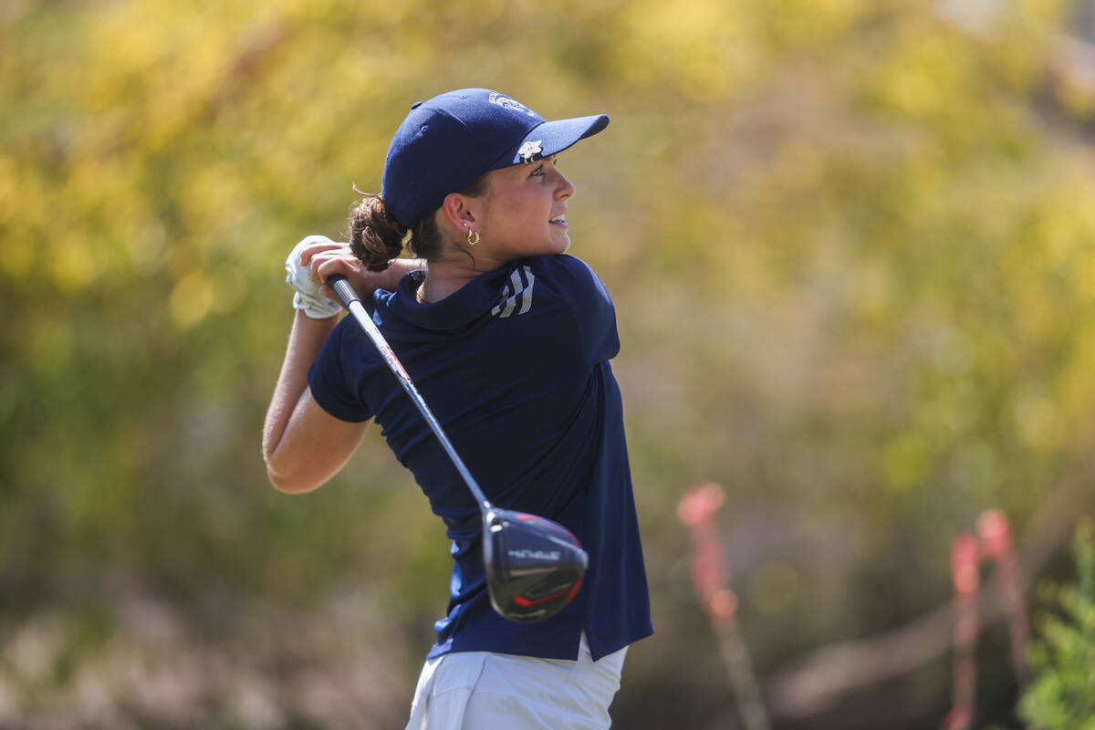 Shadow Ridge’s Holly Rodriguez tee’s off during Class 5A girls golf Mountain Leag ...