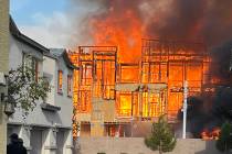 Smoke and flames erupt from a construction site fire in North Las Vegas Tuesday, August 5, 2025 ...