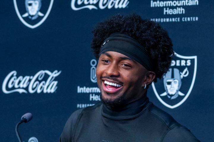 Raiders cornerback Kyu Blu Kelly (36) laughs at a media question during training camp at the In ...