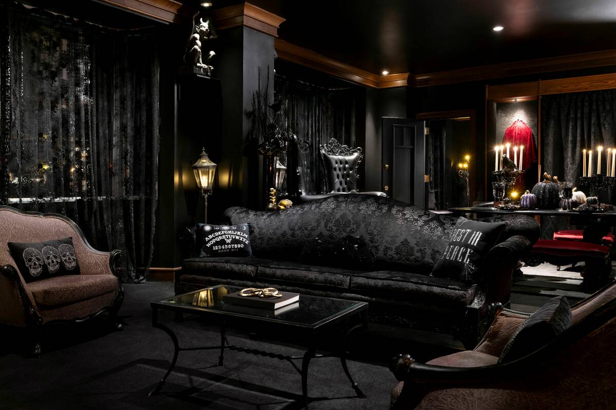 The Halloween suite at Westgate Las Vegas features gothic decor, flickering candlelight, spooky ...