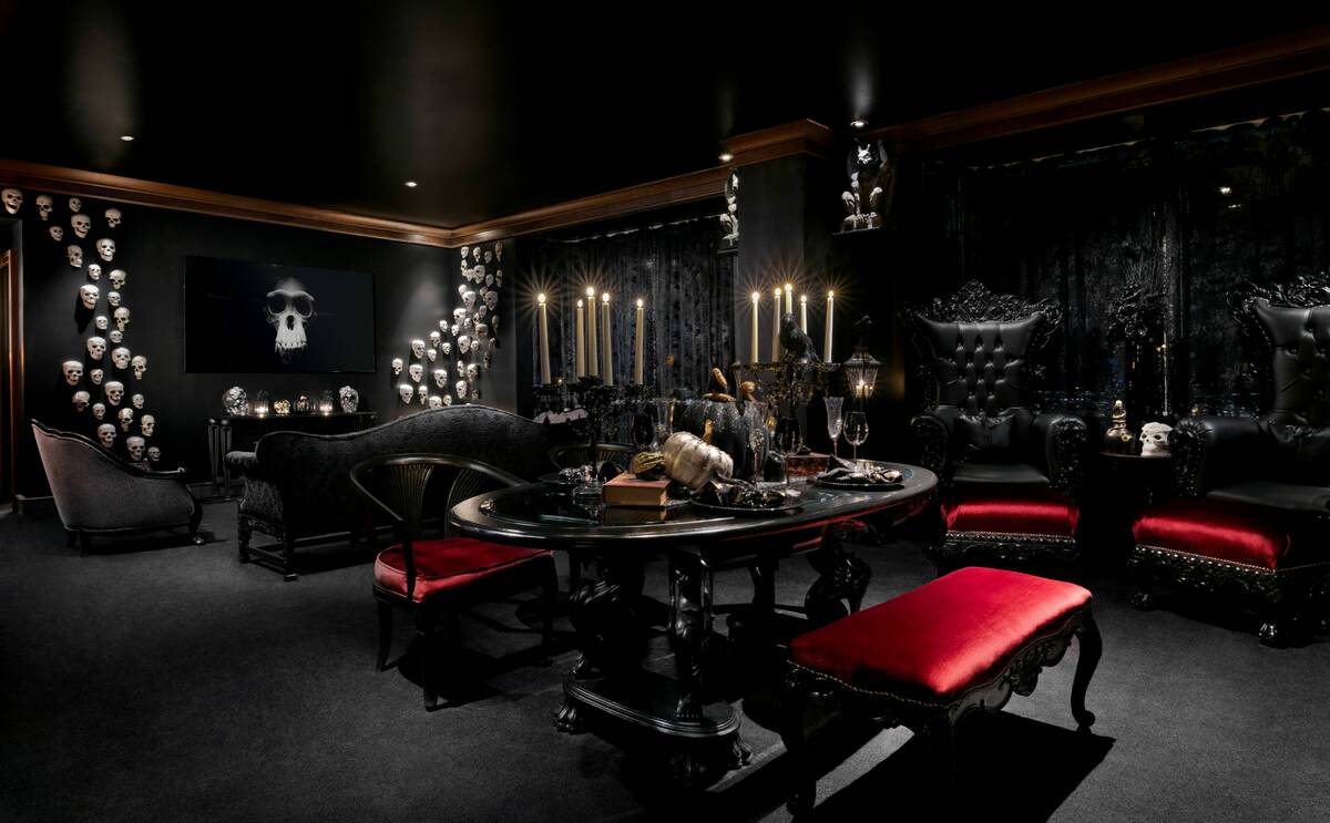 The Halloween suite at Westgate Las Vegas features gothic decor, flickering candlelight, spooky ...
