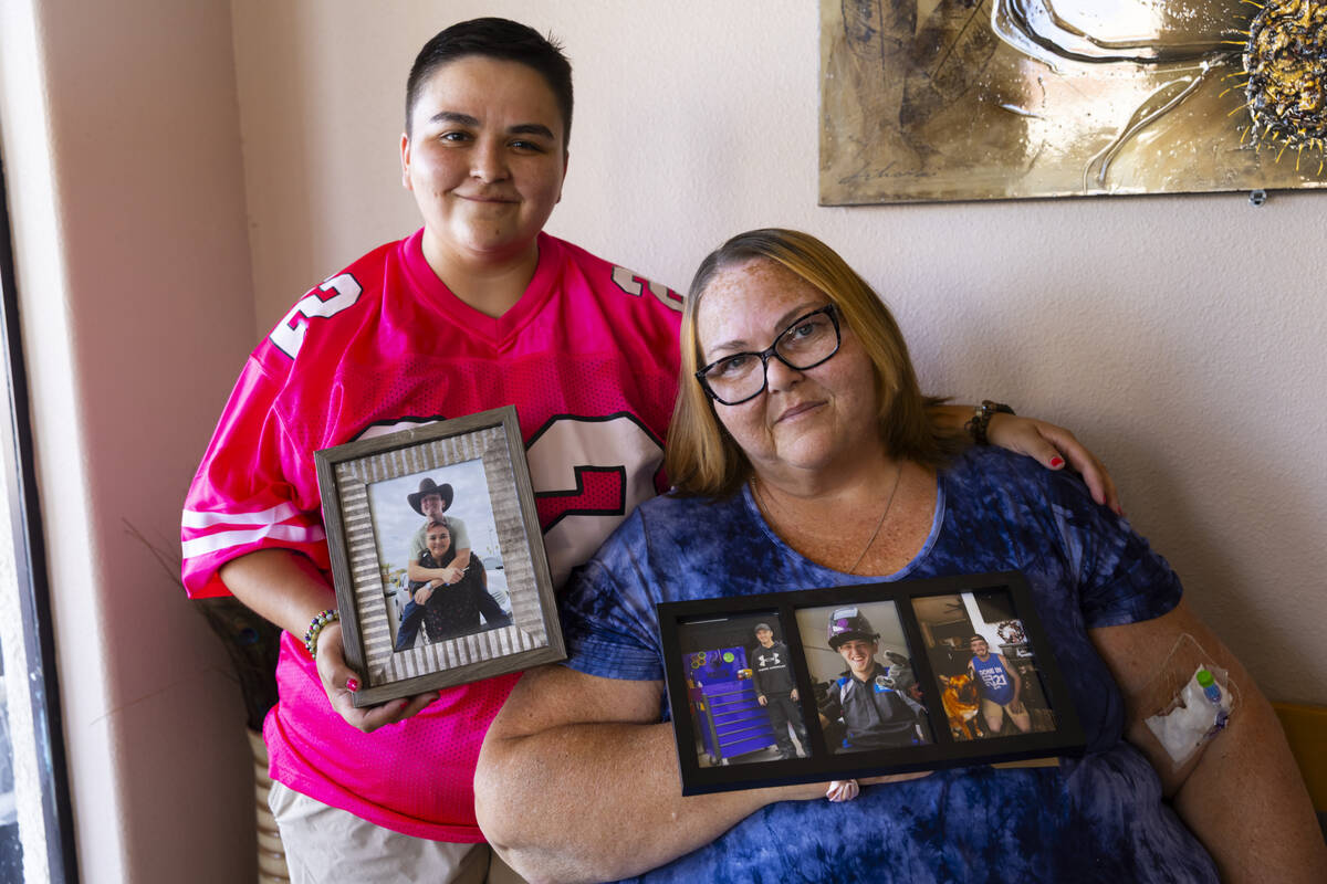 Toni Lee, right, holds a photo of her son, Jacob Lee, alongside her daughter Katelynn Long on T ...