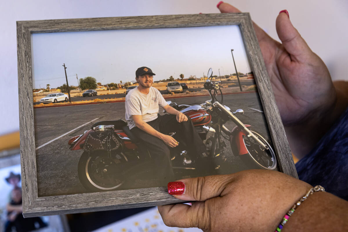Toni Lee holds a photo of her son, Jacob Lee, on Thursday, Aug. 14, 2025, in North Las Vegas. L ...
