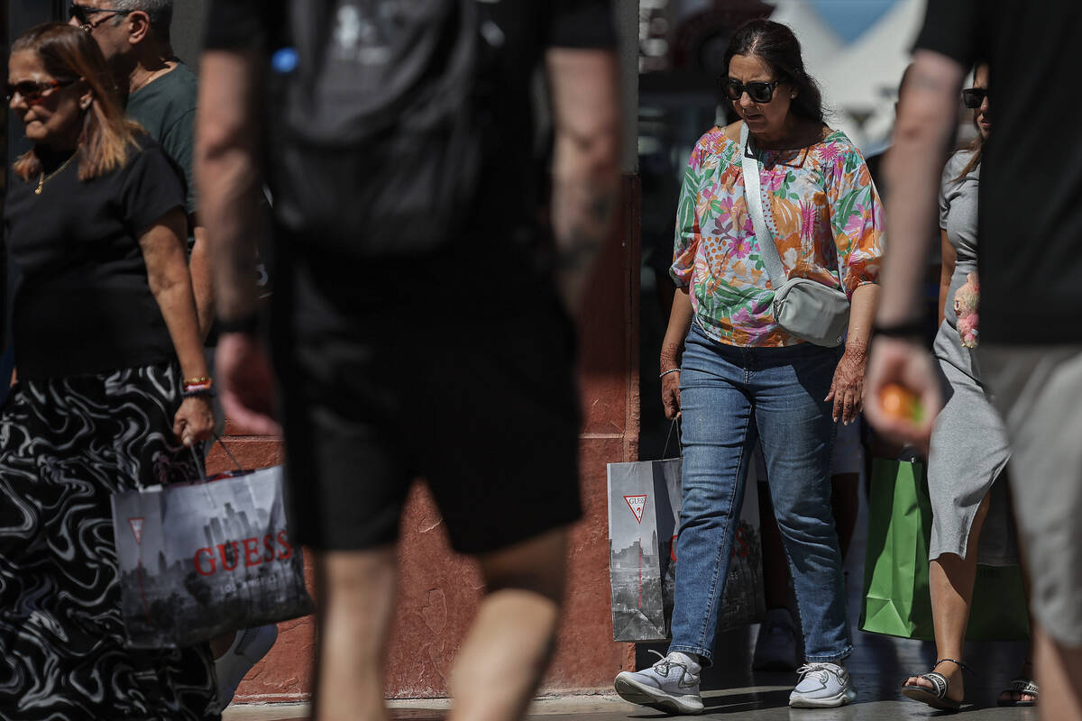 People shop at Las Vegas North Premium Outlets on Monday, Aug. 18, 2025, in Las Vegas. (Benjami ...
