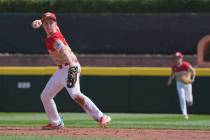 Summerlin South's Cache Malan throws to first base against Bonney Lake, Wash., during the firs ...