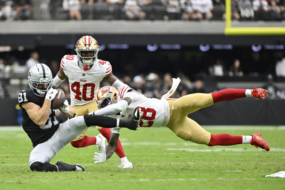 Las Vegas Raiders wide receiver Alex Bachman (81) makes a catch next to San Francisco 49ers cor ...