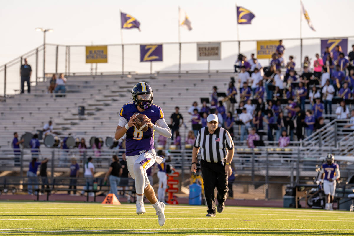 Durango Trailblazer Maddex Peterson (8) moves to make an open pass during a home matchup verse ...