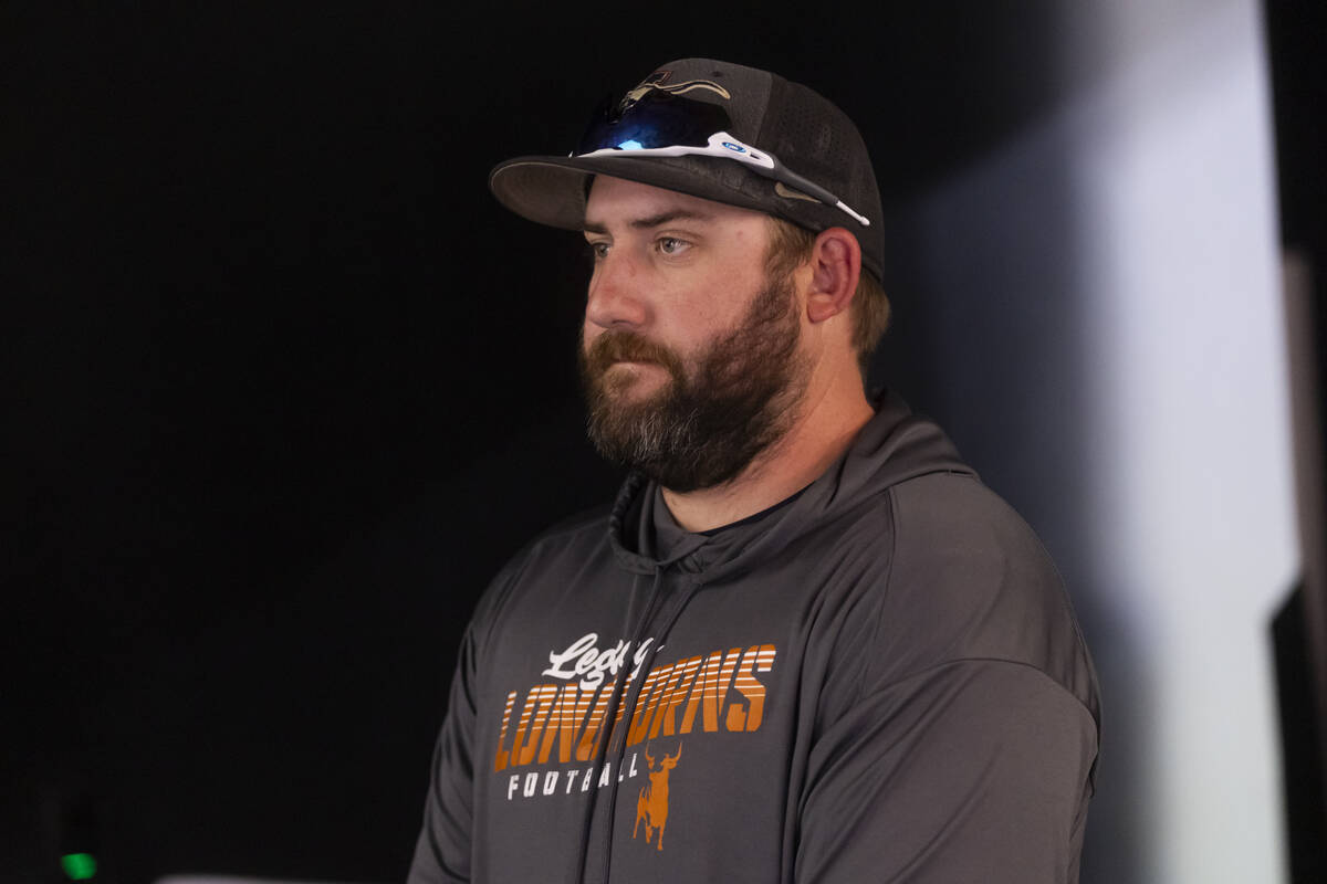 Legacy football head coach Zach Monticelli poses for a photo during a preseason meeting and med ...