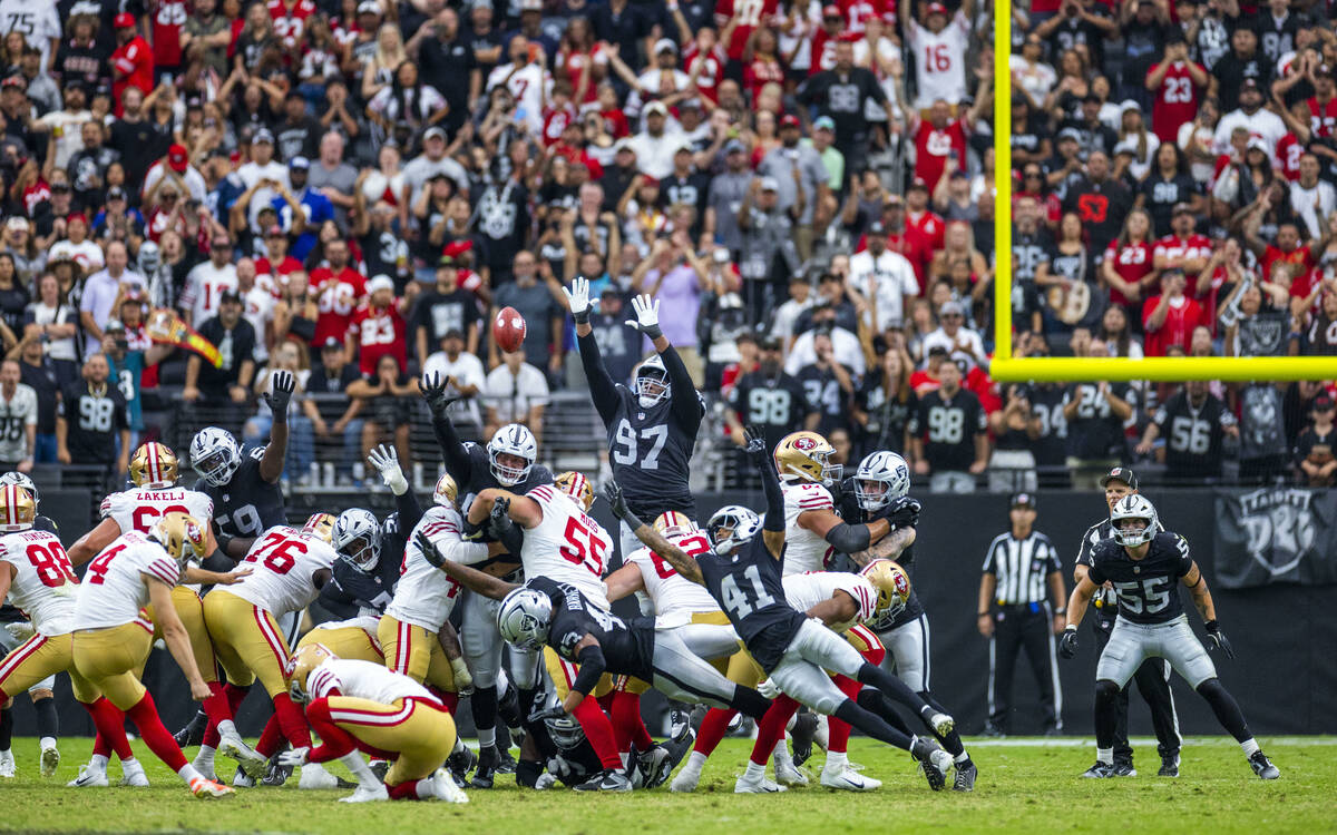 Raiders defensive tackle Tonka Hemingway (97) nearly gets the block as San Francisco 49ers plac ...