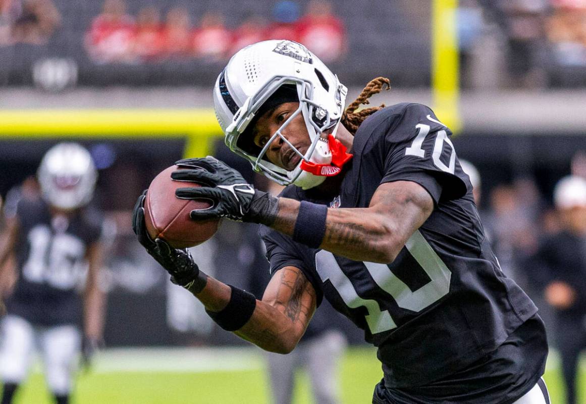 Raiders wide receiver Dont'e Thornton Jr. (10) catches a pass during warm ups of their pre-seas ...
