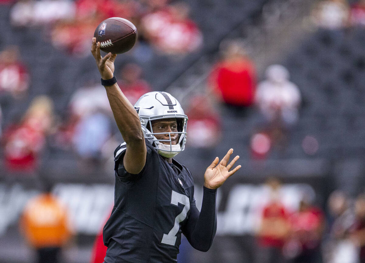 Raiders quarterback Geno Smith (7) gets off a pass during warm ups of their pre-season NFL game ...