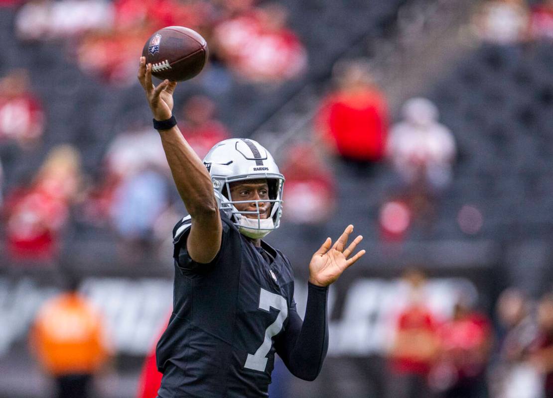Raiders quarterback Geno Smith (7) gets off a pass during warm ups of their pre-season NFL game ...