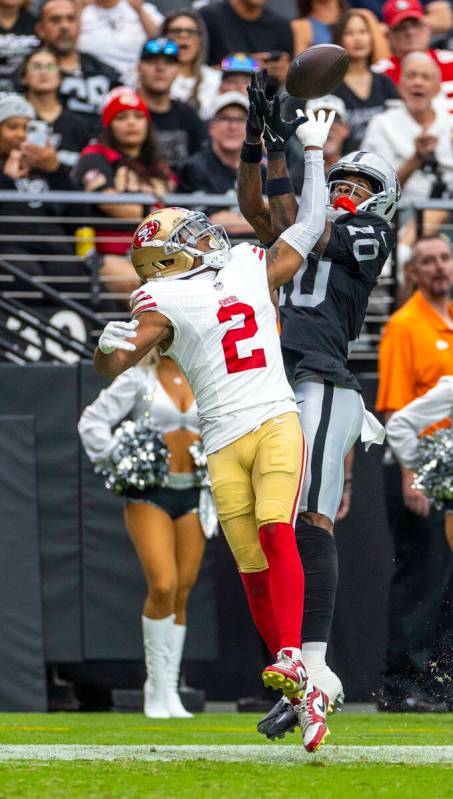 Raiders wide receiver Dont'e Thornton Jr. (10) battles for a catch against San Francisco 49ers ...