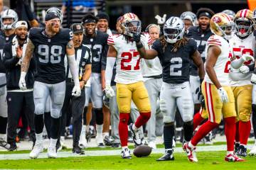 Raiders running back Ashton Jeanty (2) points to another first down against San Francisco 49ers ...