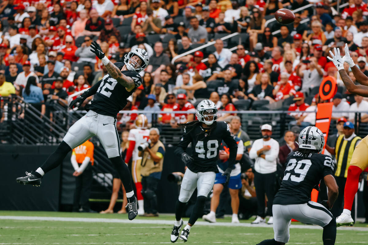 Raiders linebacker Matt Jones (42) leaps up to try and break up a pass intended for a San Franc ...