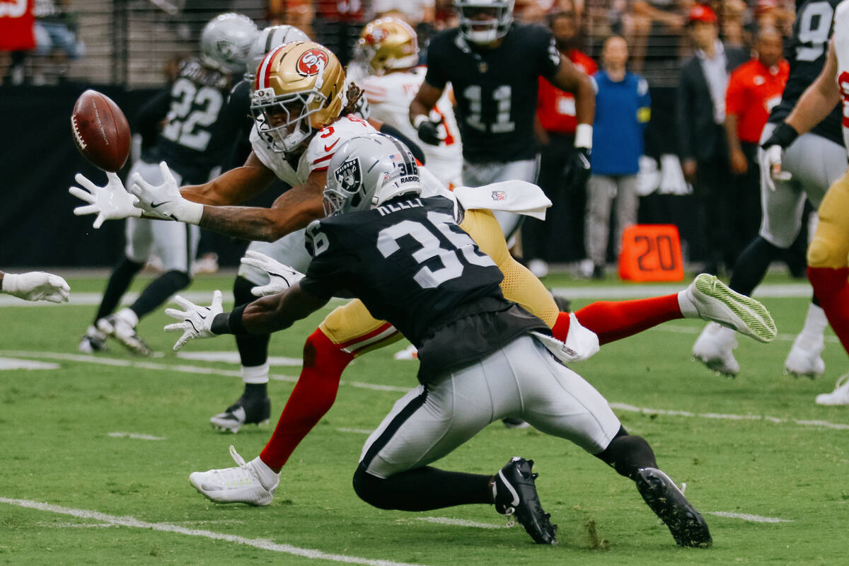 San Francisco 49ers wide receiver Demarcus Robinson (5) leaps to try and catch the ball as Raid ...