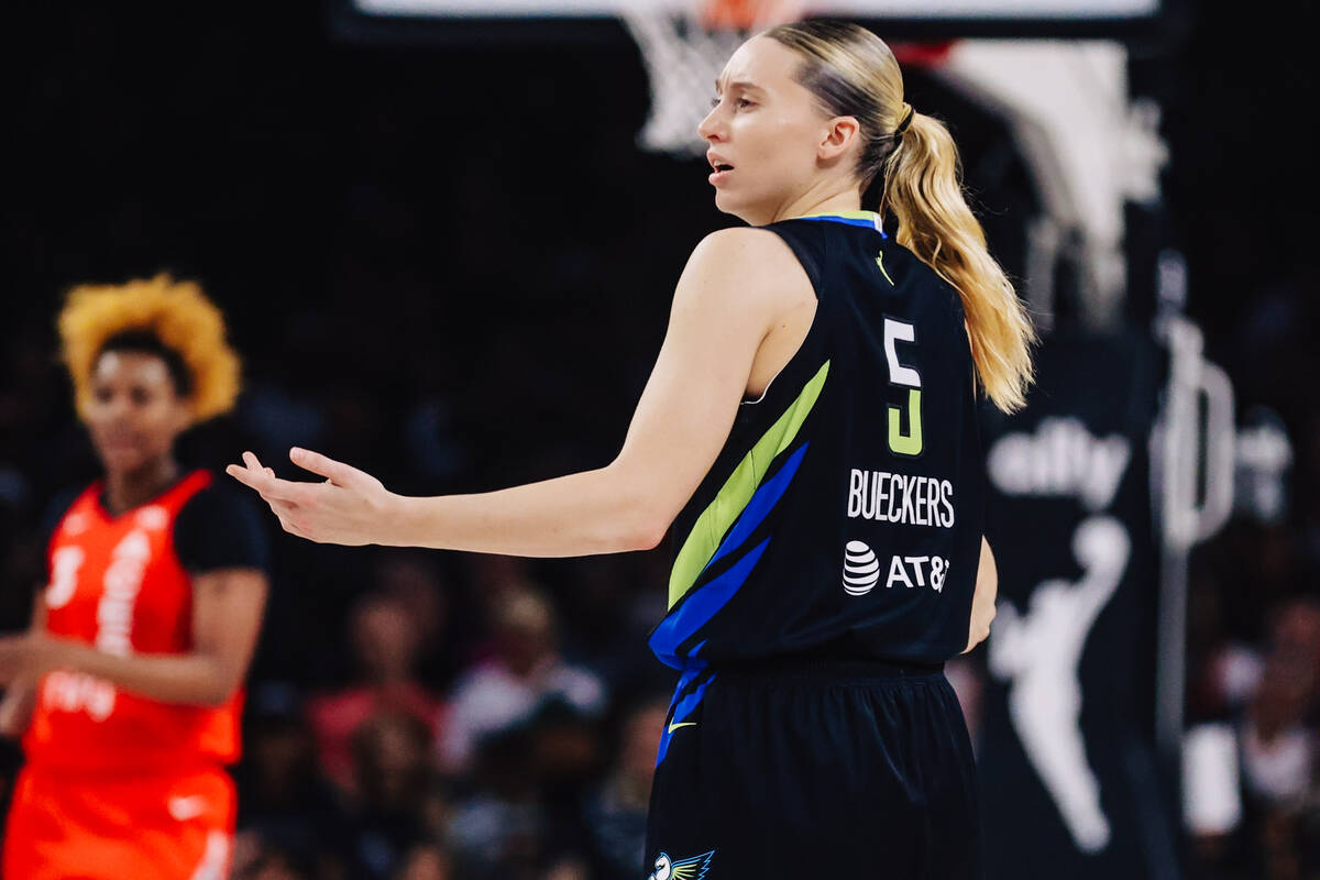 Dallas Wings guard Paige Bueckers (5) gestures to a referee during a WNBA basketball game betwe ...