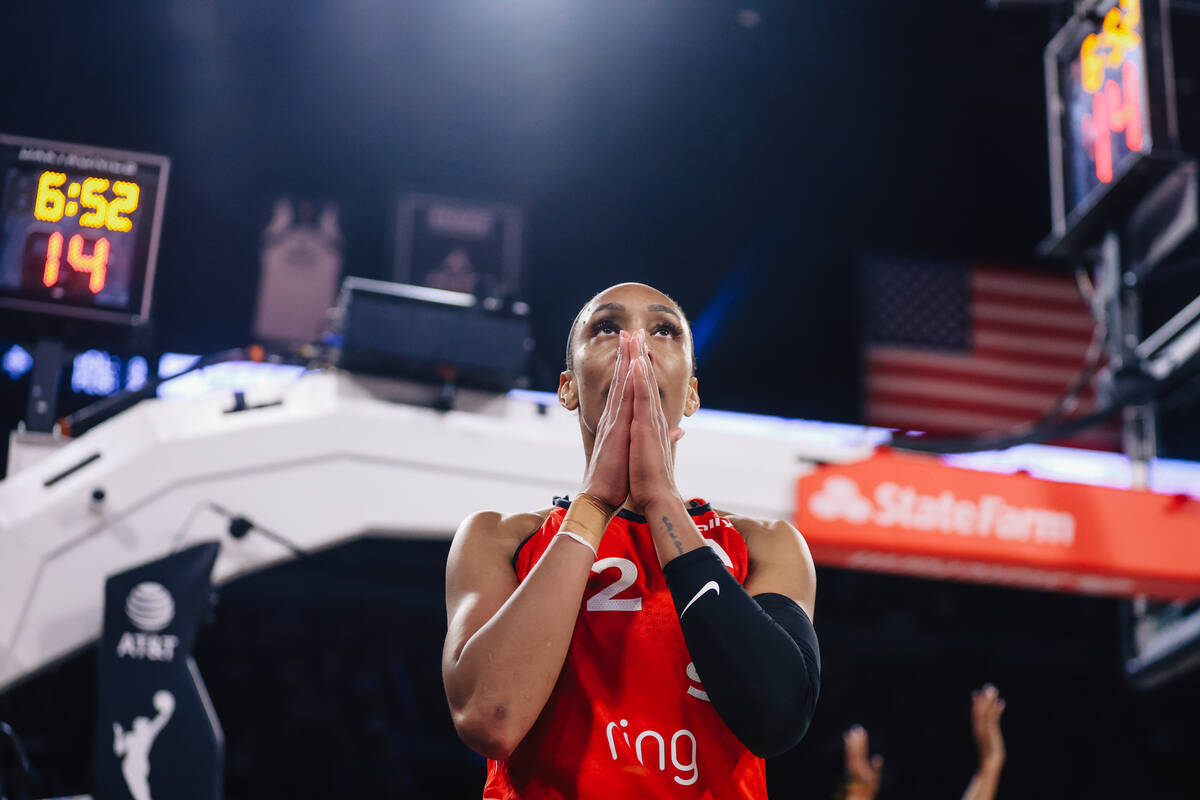 Aces center A'ja Wilson reacts after drawing a foul during a WNBA basketball game between the A ...