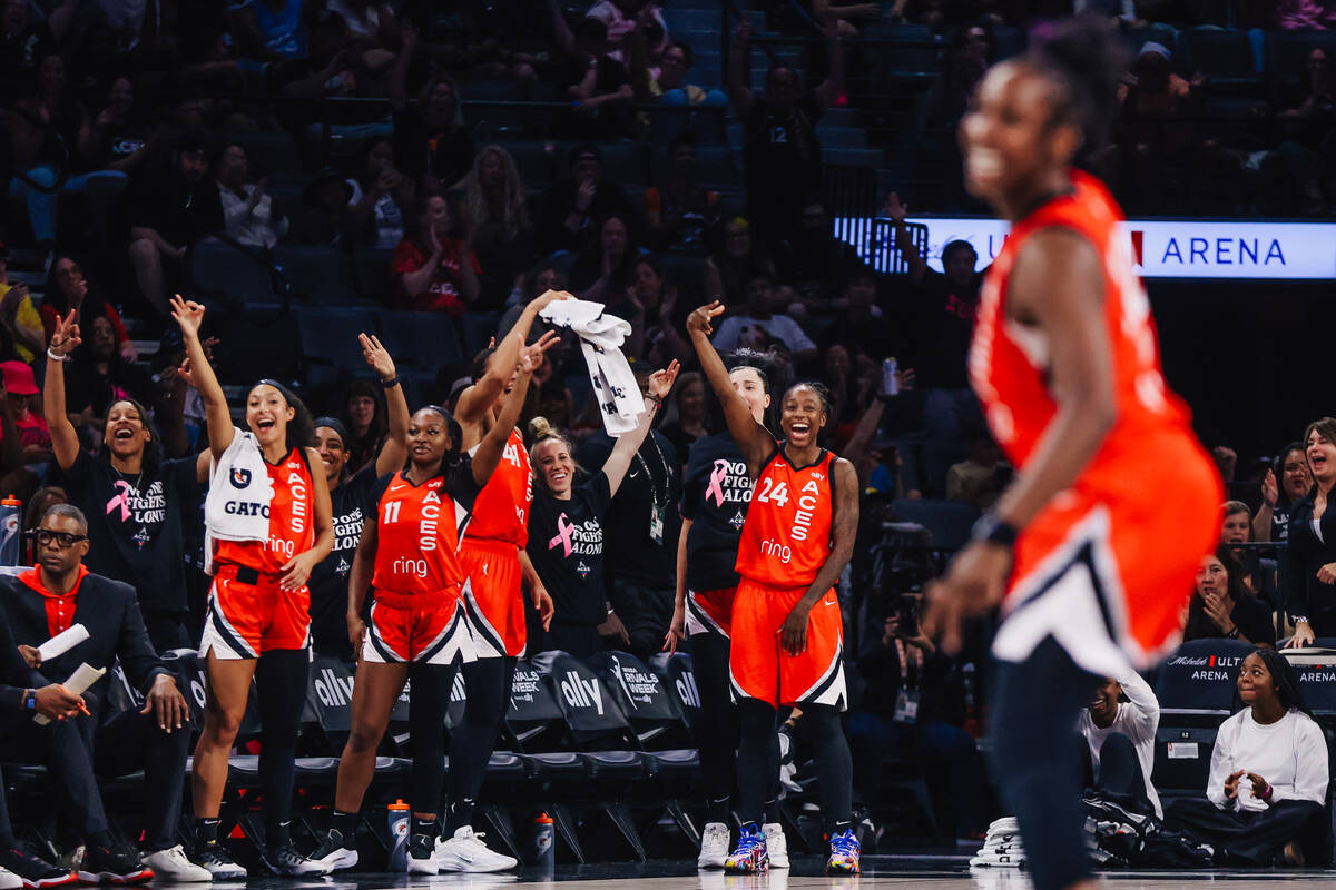 The Aces bench celebrates during a WNBA basketball game between the Aces and Dallas Wings at Mi ...