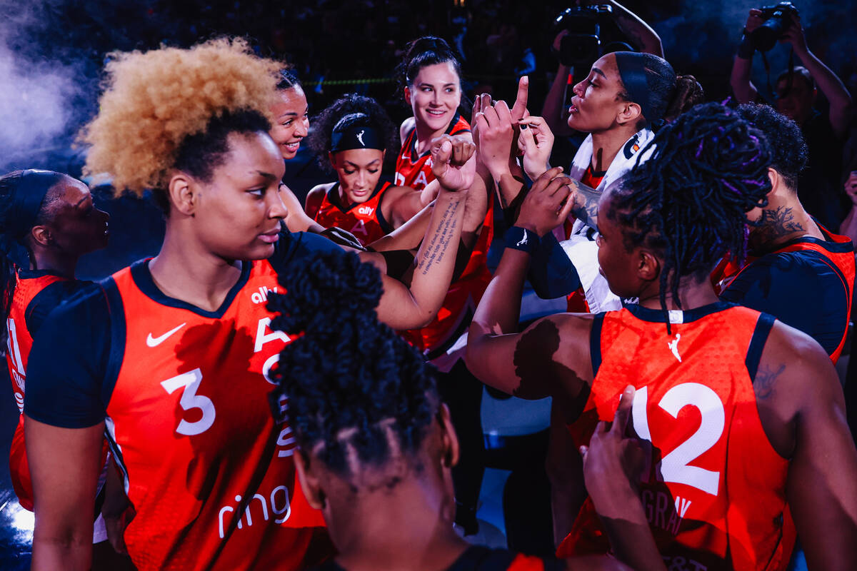 The Aces huddle following a WNBA basketball game between the Aces and Dallas Wings at Michelob ...