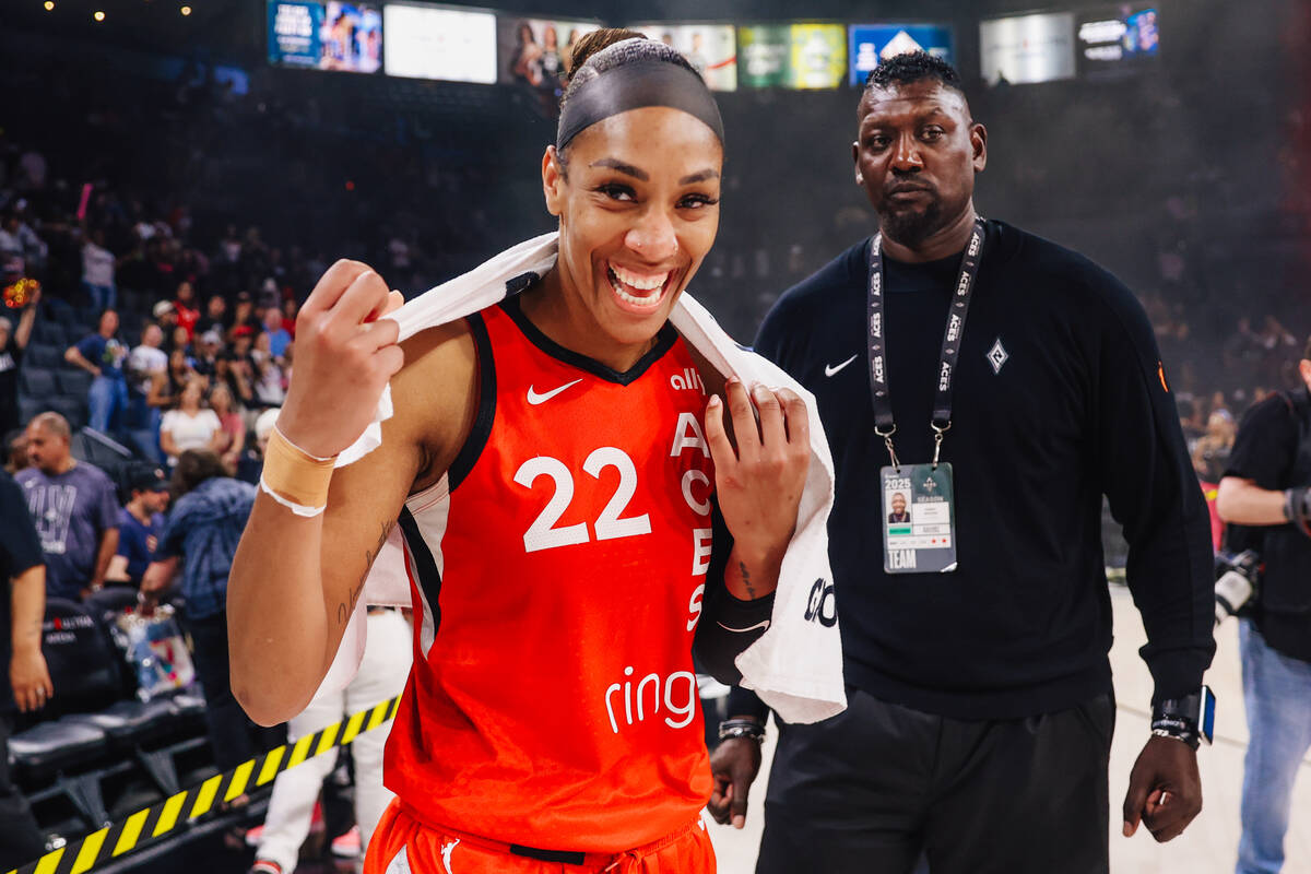 Aces center A'ja Wilson (22) smiles after a WNBA basketball game between the Aces and Dallas Wi ...