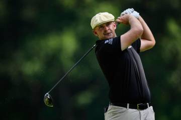 Harry Hall, of England, plays his shot from the seventh tee during the second round of the BMW ...