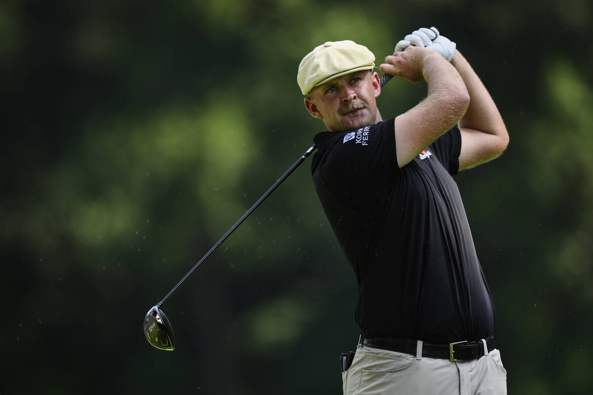 Harry Hall, of England, plays his shot from the seventh tee during the second round of the BMW ...