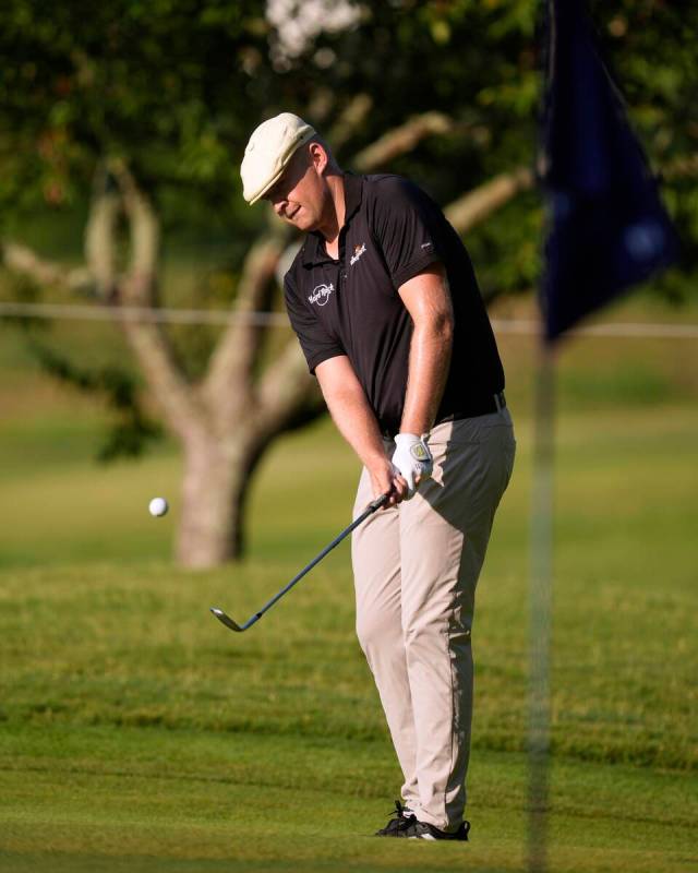 Harry Hall, of England, chips on second hole during the first round of the St. Jude Championshi ...