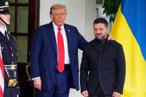 President Donald Trump, left, greets Ukraine's President Volodymyr Zelenskyy as he arrives at t ...