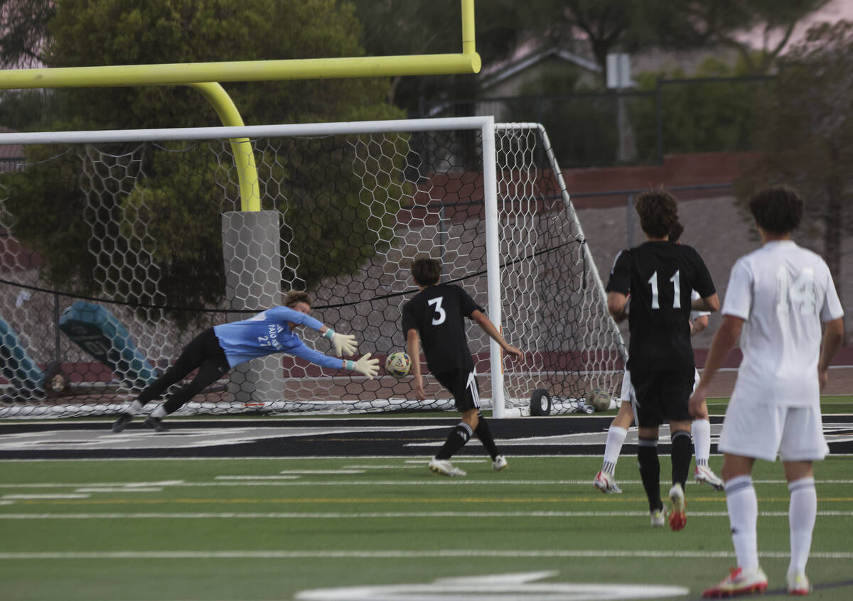 Palo Verde goalkeeper Landon Blanchard (27) tries to stop the ball as Desert Oasis scores a goa ...