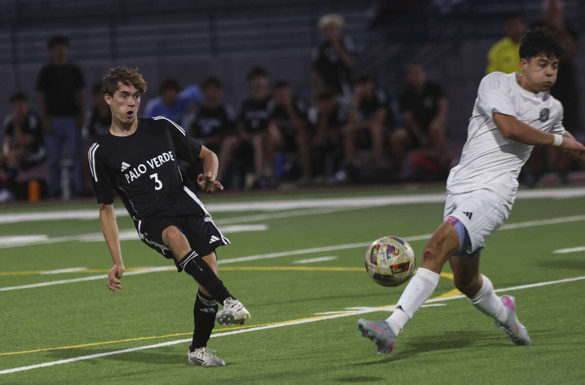 Palo Verde’s Henry Reed (3) kicks the ball against Desert Oasis during a soccer game at ...