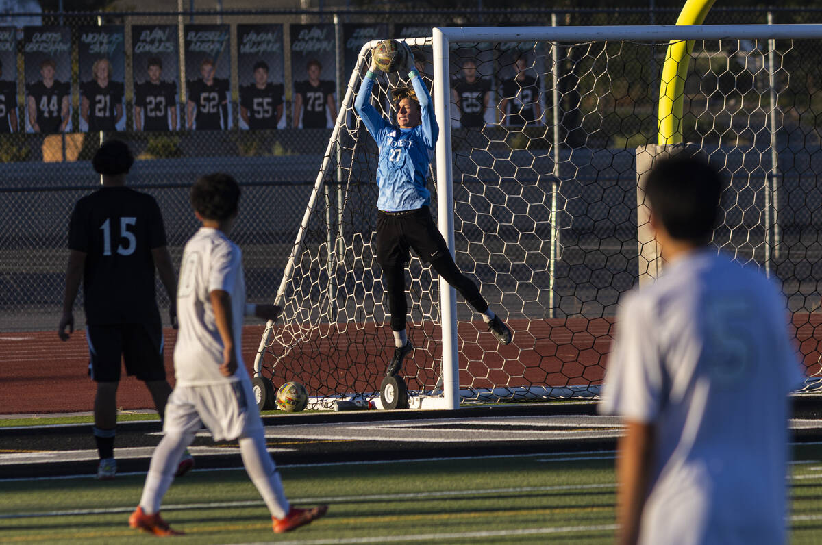 Palo Verde goalkeeper Landon Blanchard (27) blocks a shot from Desert Oasis during a soccer gam ...