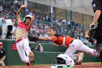 Fairfield, Conn.'s Jimmy Taxiltaridis tags out Las Vegas, Nev.'s Cutter Ricafort at home plate ...