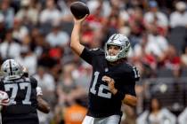 Raiders quarterback Aidan O'Connell (12) throws against the San Francisco 49ers during the seco ...