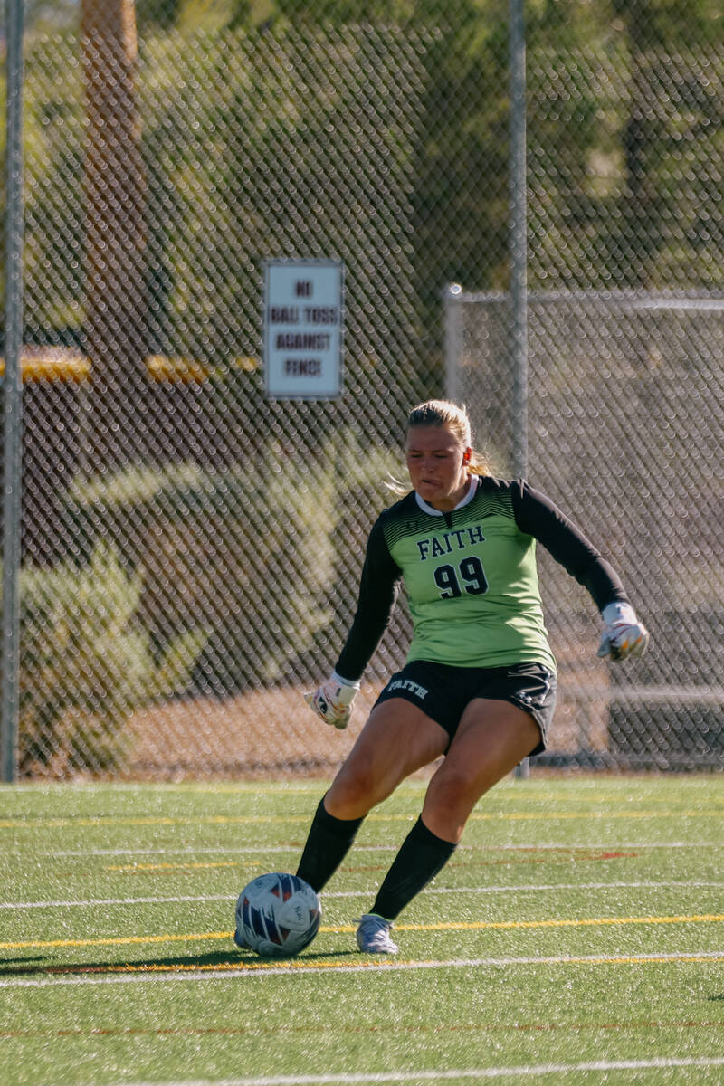 Faith Lutheran goalkeeper Olivia Petty (99) kicks the ball during a girls’ soccer game a ...