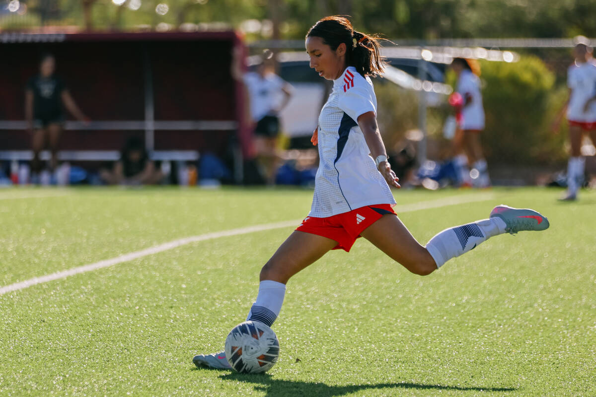 Liberty defender Isabella Valadez (11) launches the ball upfield during a girls’ soccer ...
