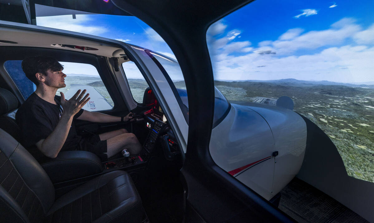 Aspiring pilot Jake Harper talks with an instructor as he takes a flight demo in a state-of-the ...