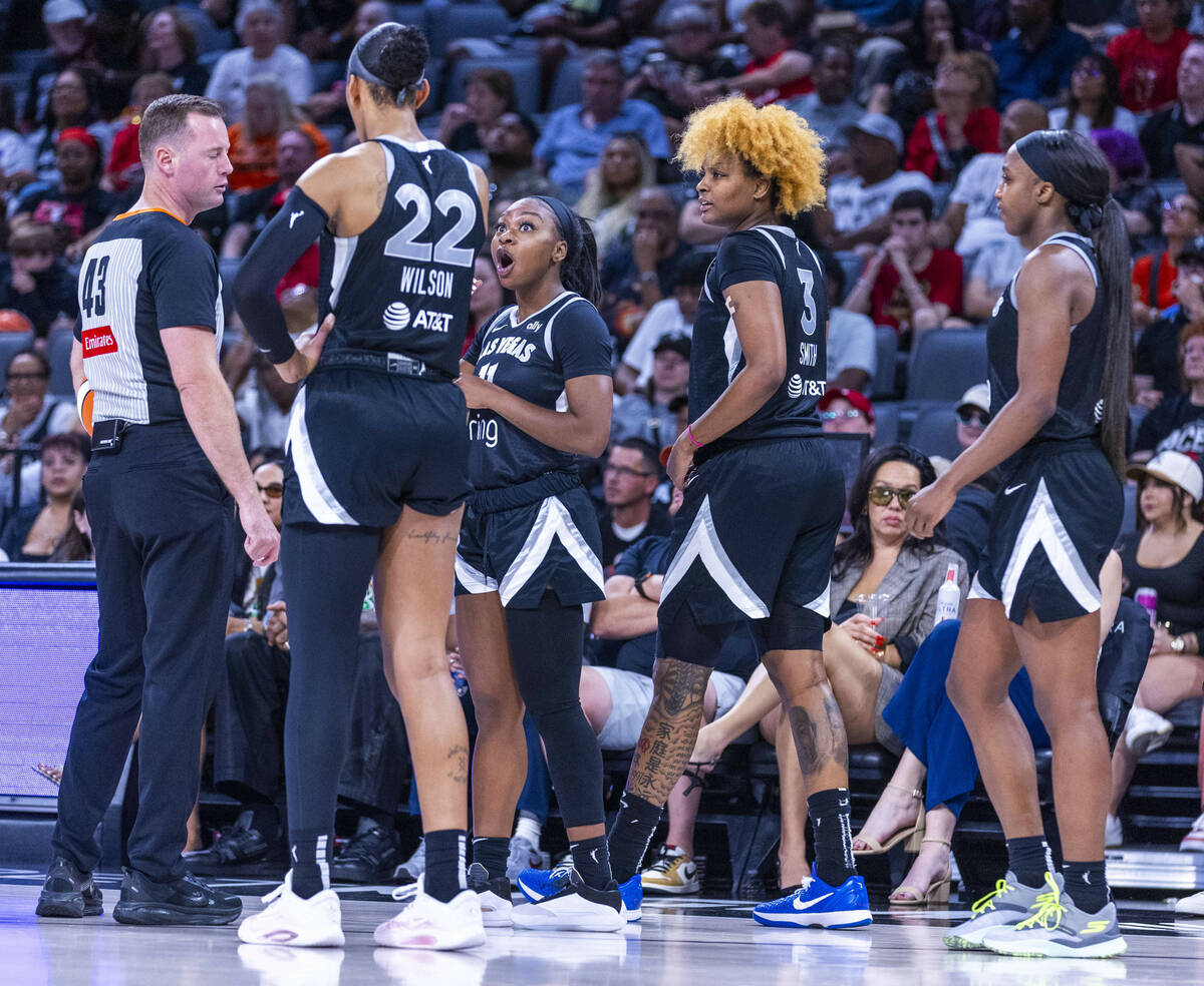 Aces guard Dana Evans (11) is shocked by a call beside teammates against the Atlanta Dream guar ...