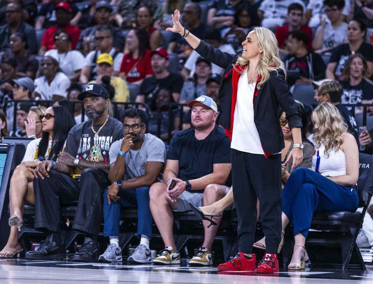 Aces head coach Becky Hammon calls a play against the Atlanta Dream guard Rhyne Howard (10) dur ...
