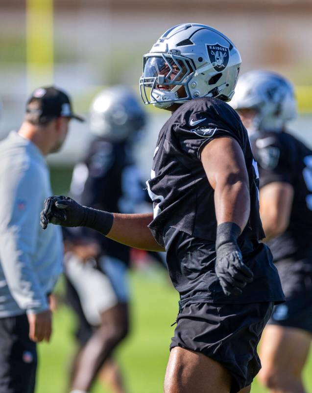 Raiders defensive end Tyree Wilson (9) runs to the side during warm ups at the Intermountain H ...