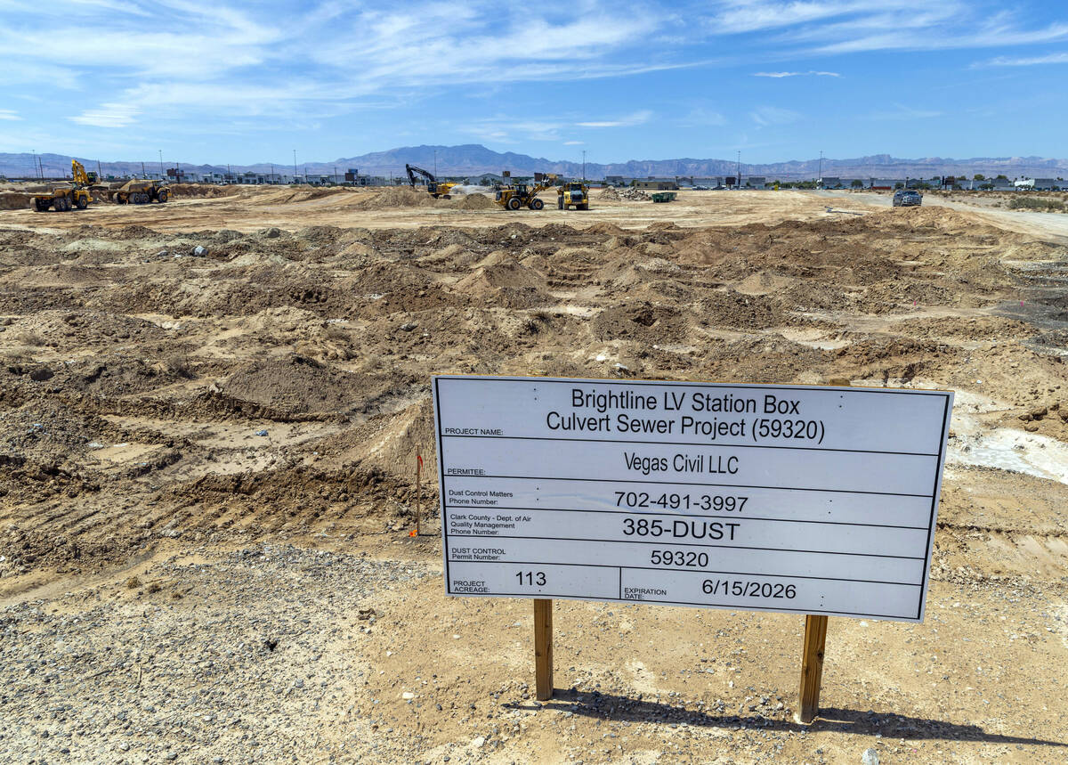 Soil is scraped and hauled as grading work continues on Brightline West's land on Wednesday, Au ...