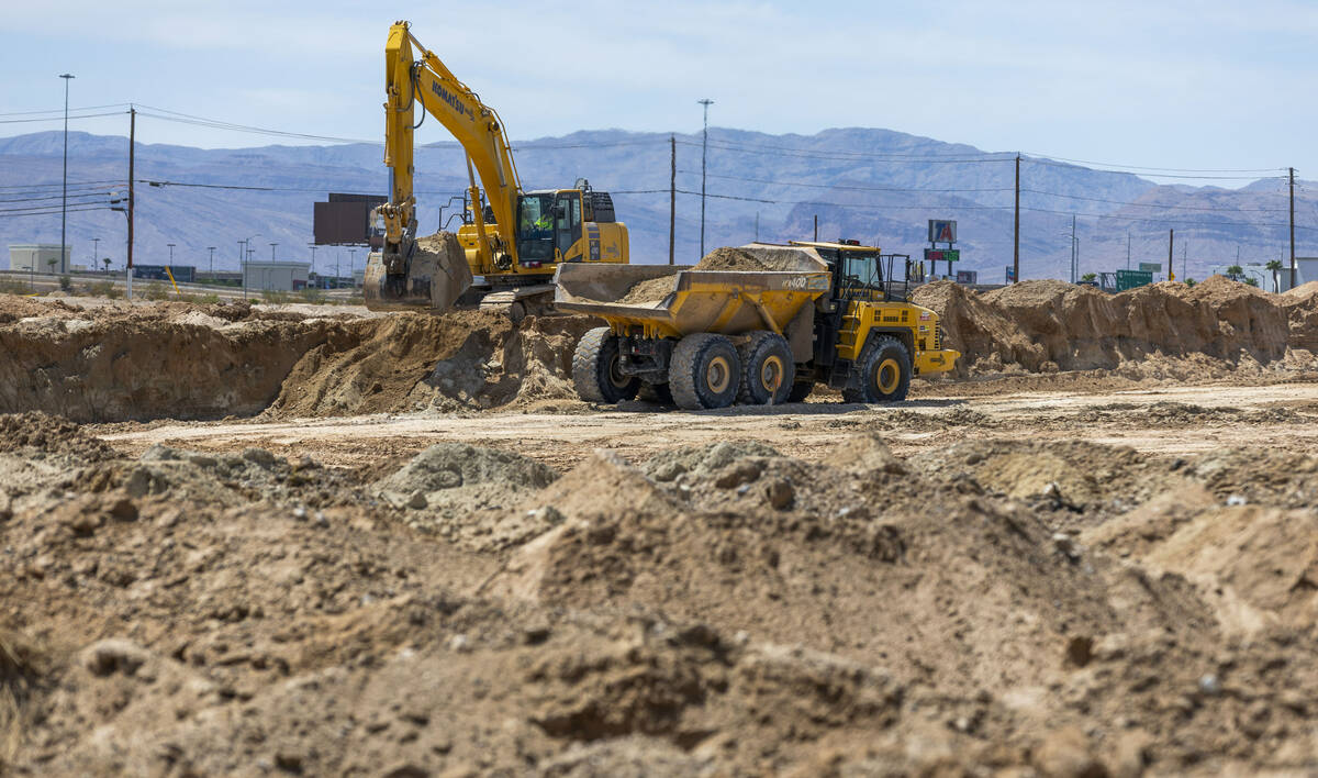 Soil is scraped and hauled as grading work continues on Brightline West's land on Wednesday, Au ...