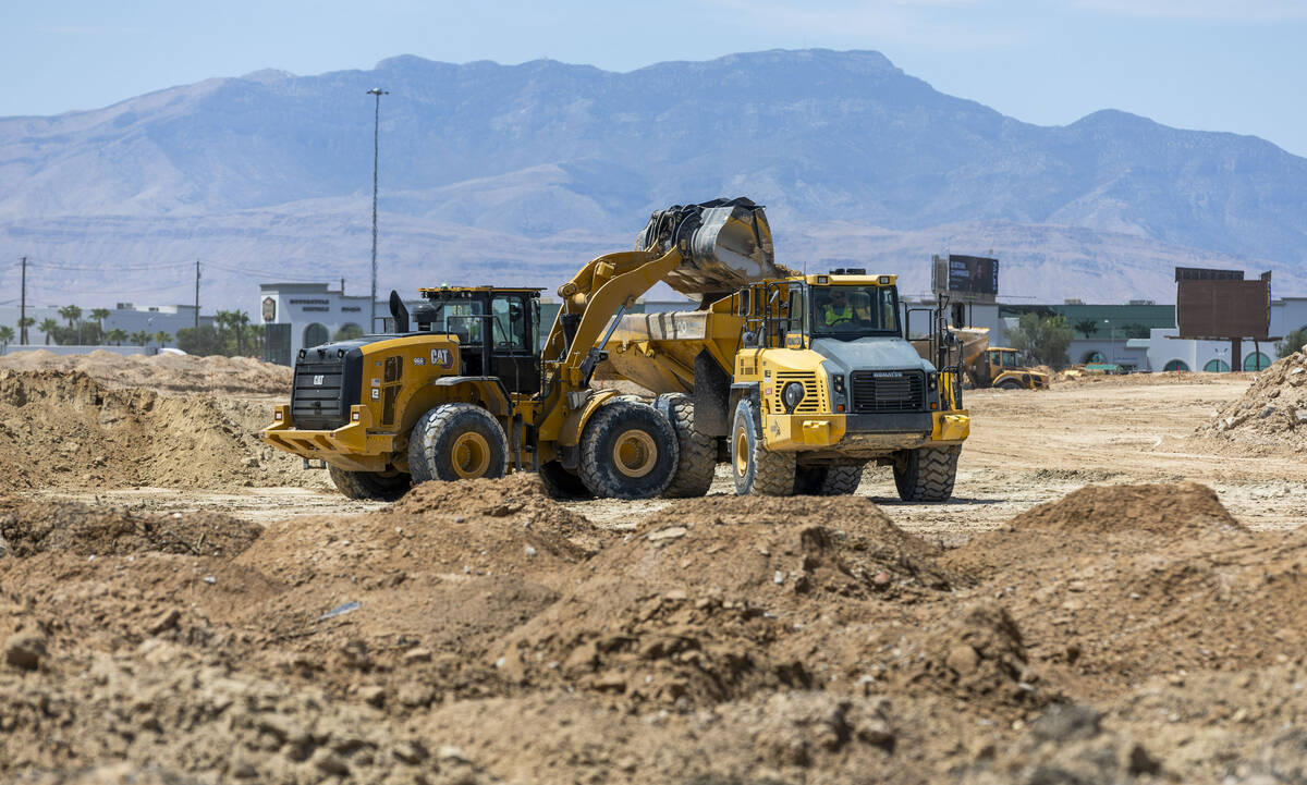 Soil is scraped and hauled as grading work continues on Brightline West's land on Wednesday, Au ...
