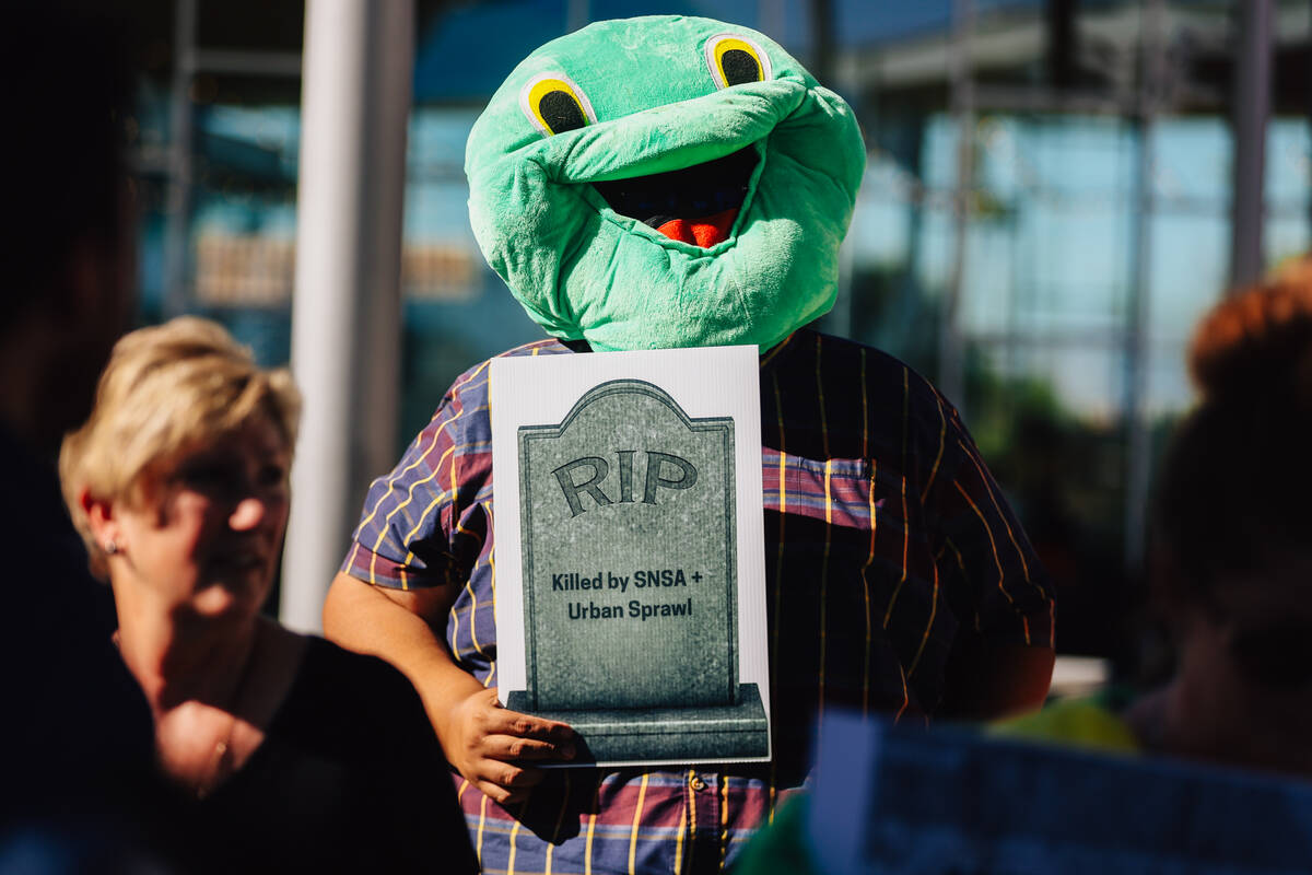 Environmental activists protest during a news conference about the Southern Nevada Supplemental ...