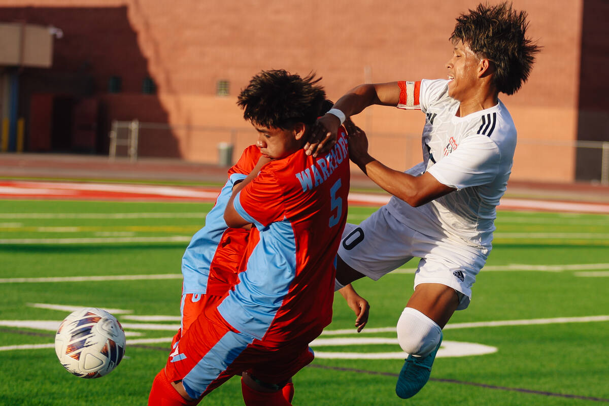 Las Vegas striker Anthony Cardenas (10) tries to pry an opening between defenders for the ball ...