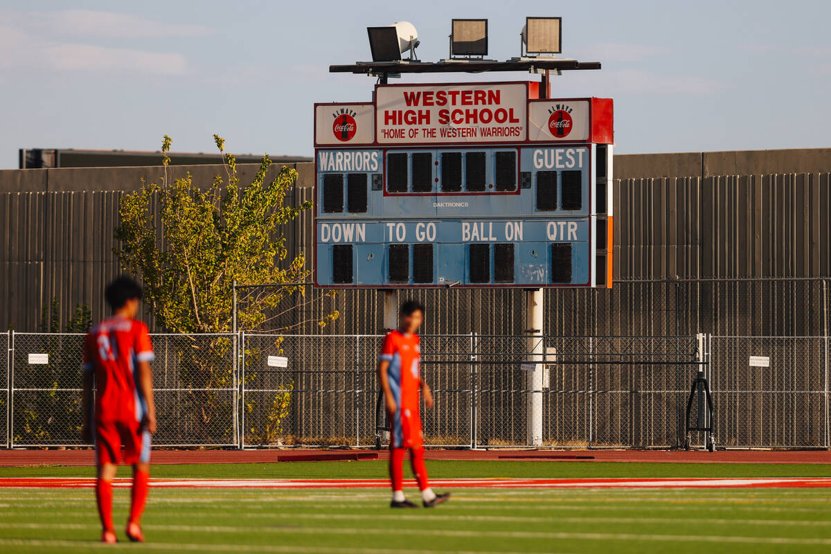 The Western score board stands during a high school boys soccer game between Western and Las Ve ...